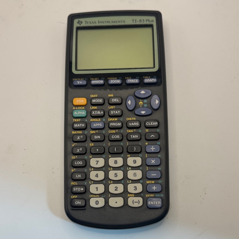 Texas Instruments TI-83 Plus Graphing Calculator - Gray and Black